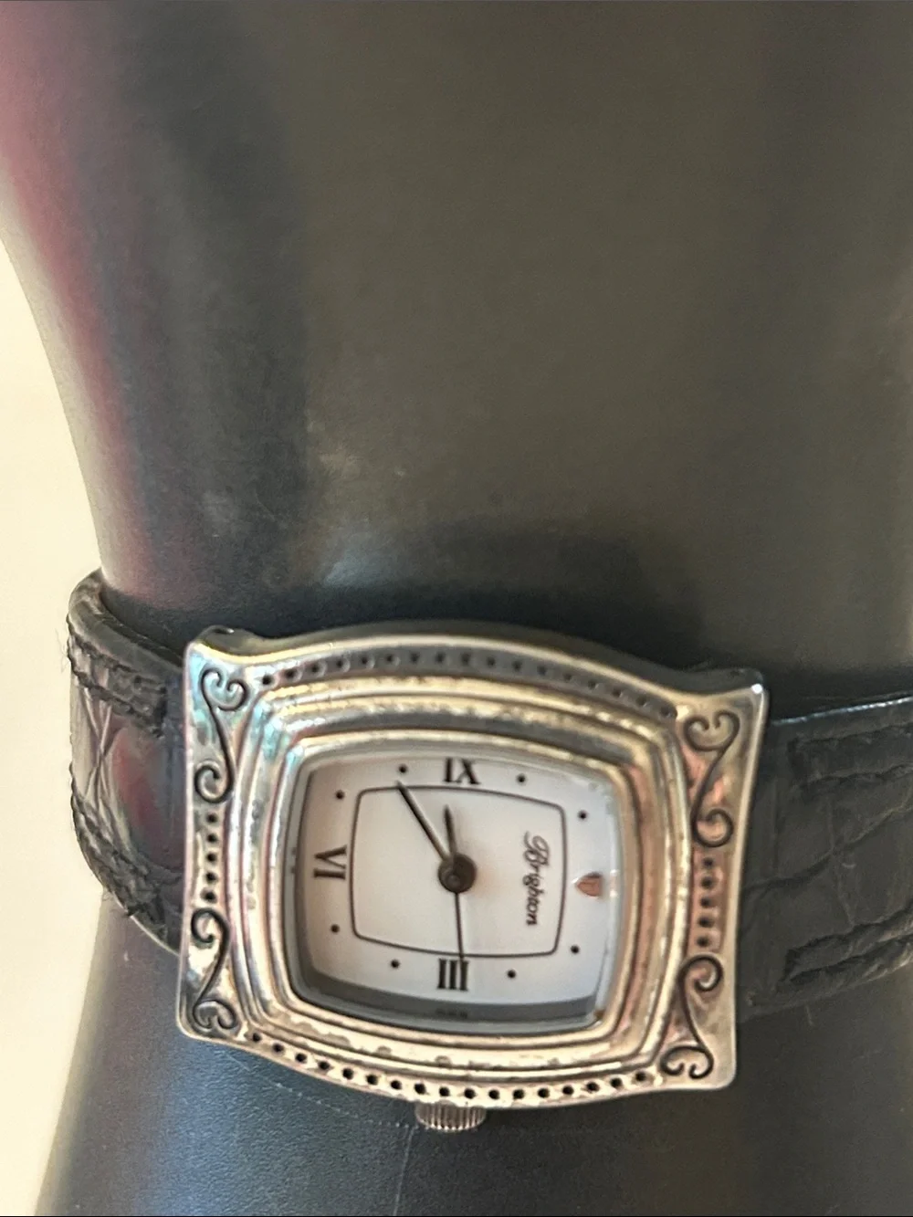 Brighton, silver plated watch with black leather band, filagree, scroll work